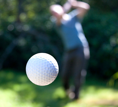 A golf ball in flight