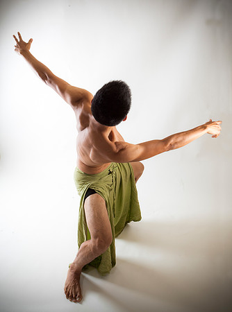 Modern dancer in green skirt
